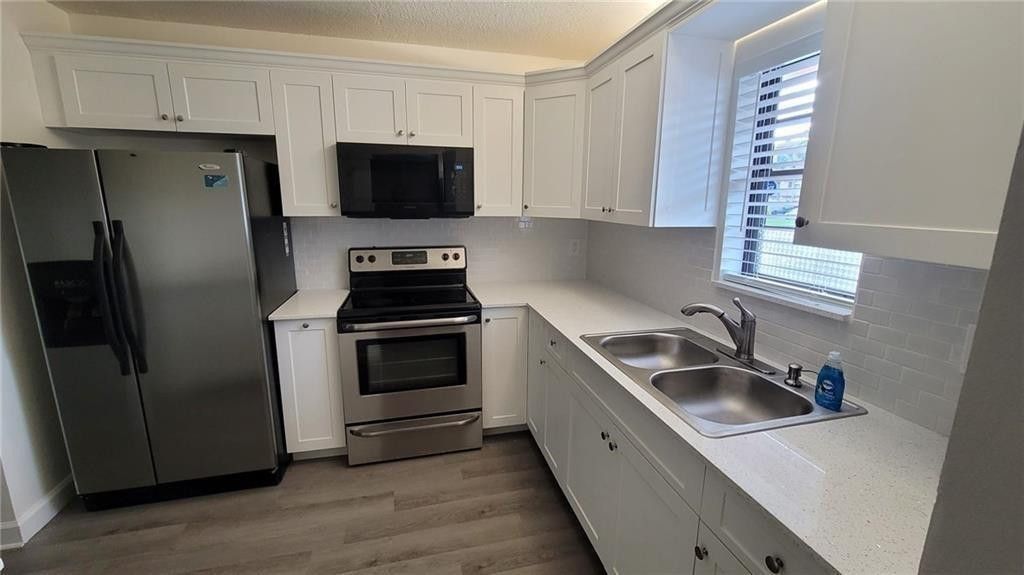Photo of 9273 SW 8th Street #109, Boca Raton, FL 33428 (MLS # B26030869)