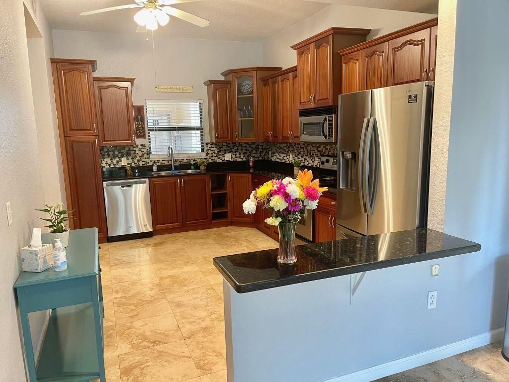Photo of 1620 Presidential Way #202, West Palm Beach, FL 33401 (MLS # R10738675)