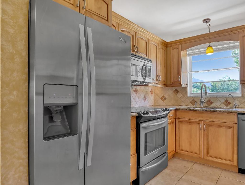 Photo of 18081 SE Country Club Drive #10-91, Tequesta, FL 33469 (MLS # R11136833)