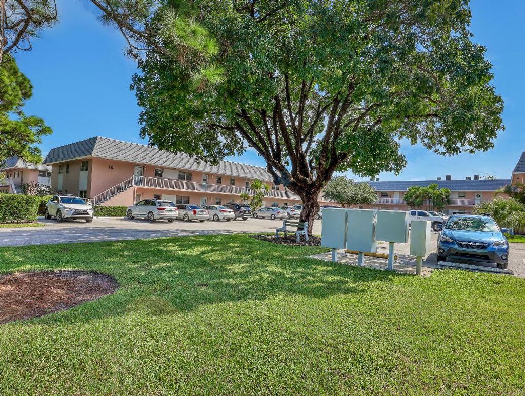 Photo of 18081 SE Country Club Drive #10-91, Tequesta, FL 33469 (MLS # R11136833)