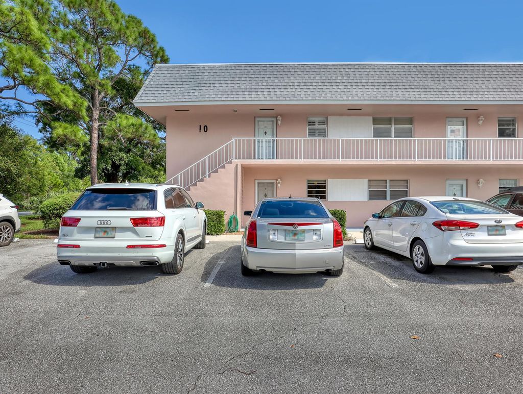 Photo of 18081 SE Country Club Drive #10-91, Tequesta, FL 33469 (MLS # R11136833)