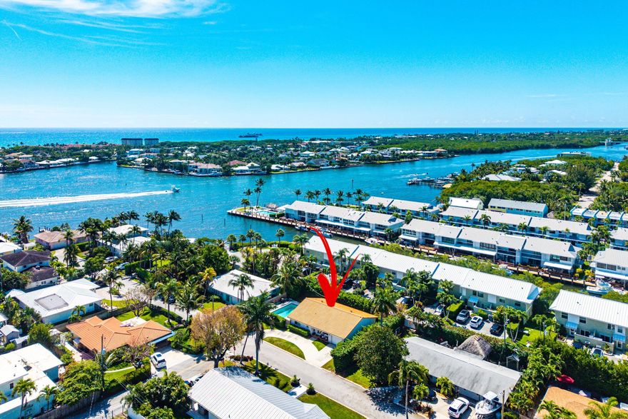 Fully renovated interior Boynton Beach home offering deeded dock space with deep water access and no fixed bridges. Ideally located near the Boynton Inlet and waterfront dining, supporting a waterfront and boating lifestyle. Private pool and fully fenced backyard with tropical landscaping and mature shade tree. Bright open layout with updated kitchen, gas range, large island, wine cooler, and stainless steel appliances. Primary suite features walk-in closet and French doors to the pool. Impact windows, pool bath, circular driveway, and flexible garage space complete this move-in-ready property. FEATURED HIGHLIGHTS: • Deeded dock space with deep water access and no fixed bridges • Impact windows throughout • Fully renovated interior • Private pool with fully fenced backyard • Tropical landscaping and mature shade tree • Updated kitchen with gas range, large island, and wine cooler • Bright open layout with natural light • Primary suite with walk-in closet and French doors to pool • Bathroom with direct pool access • Circular driveway with ample parking • Partial garage conversion for storage/flex space • Close to Boynton Inlet, waterfront dining, beaches, and shopping