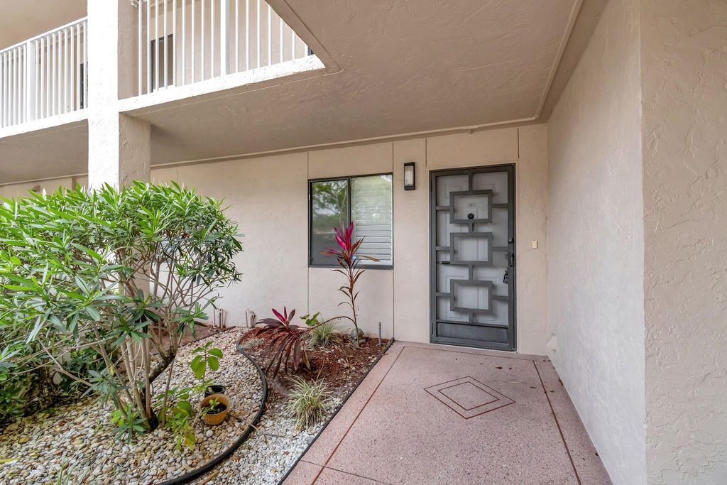 Photo of 6121 Pointe Regal Circle #110, Delray Beach, FL 33484 (MLS # R10977458)