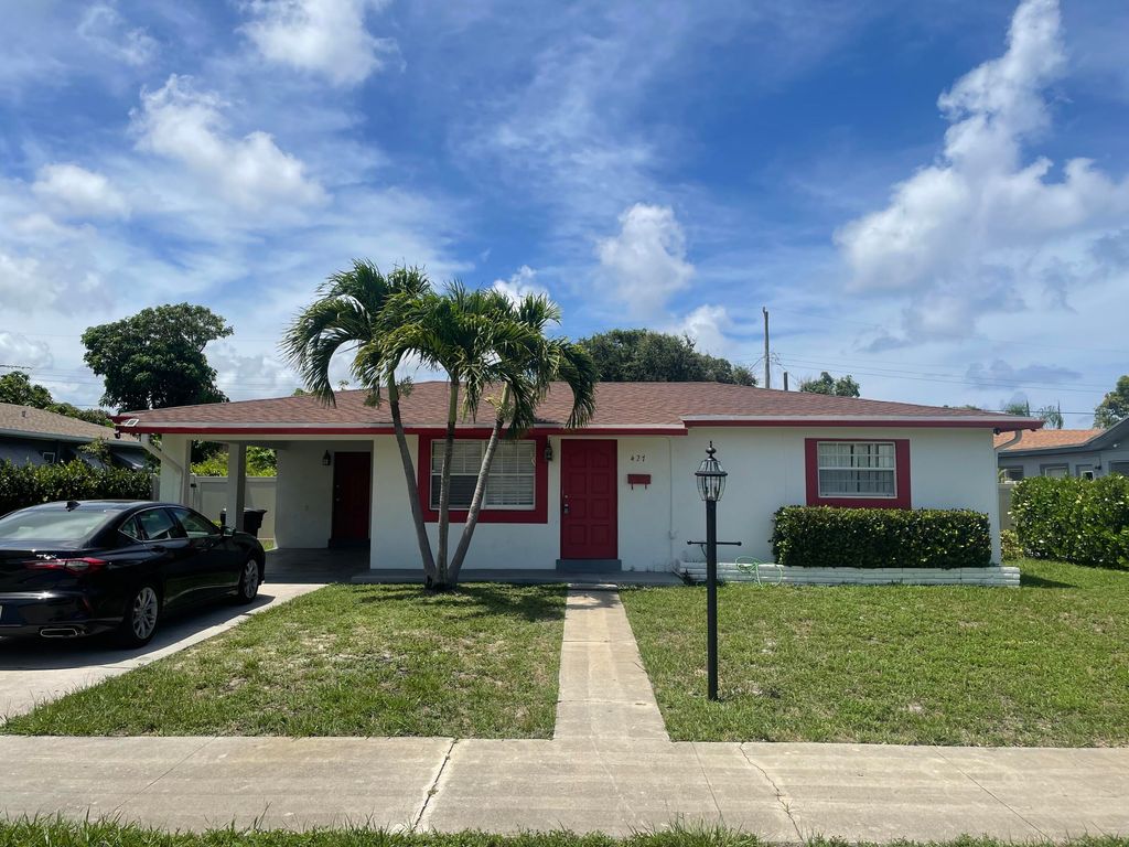 Photo of 427 Bayberry Drive Dr, Lake Park, FL 33403 (MLS # R10813733)