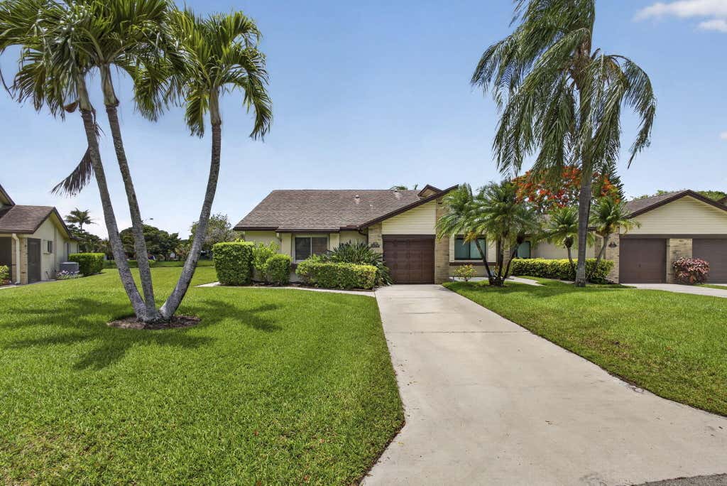 Photo of 148 Village Walk Drive #24, Royal Palm Beach, FL 33411 (MLS # B26043326)