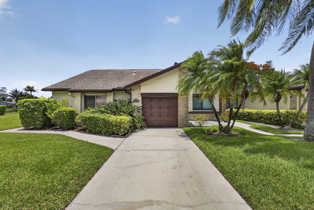 Photo of 148 Village Walk Drive #24, Royal Palm Beach, FL 33411 (MLS # B26043326)