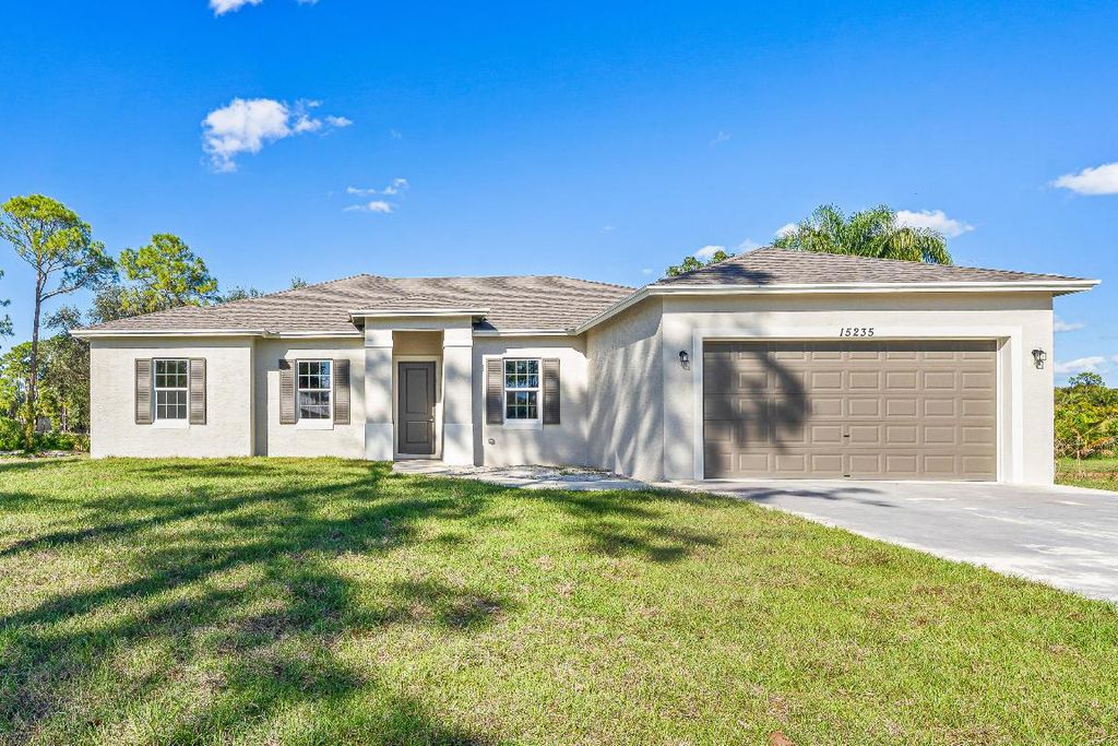 Photo of 15235 Tangelo Boulevard, The Acreage, FL 33412 (MLS # R11155492)