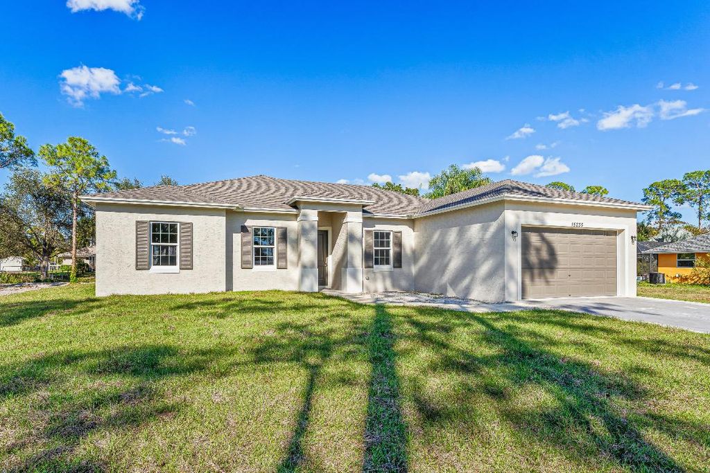 Photo of 15235 Tangelo Boulevard, The Acreage, FL 33412 (MLS # R11155492)