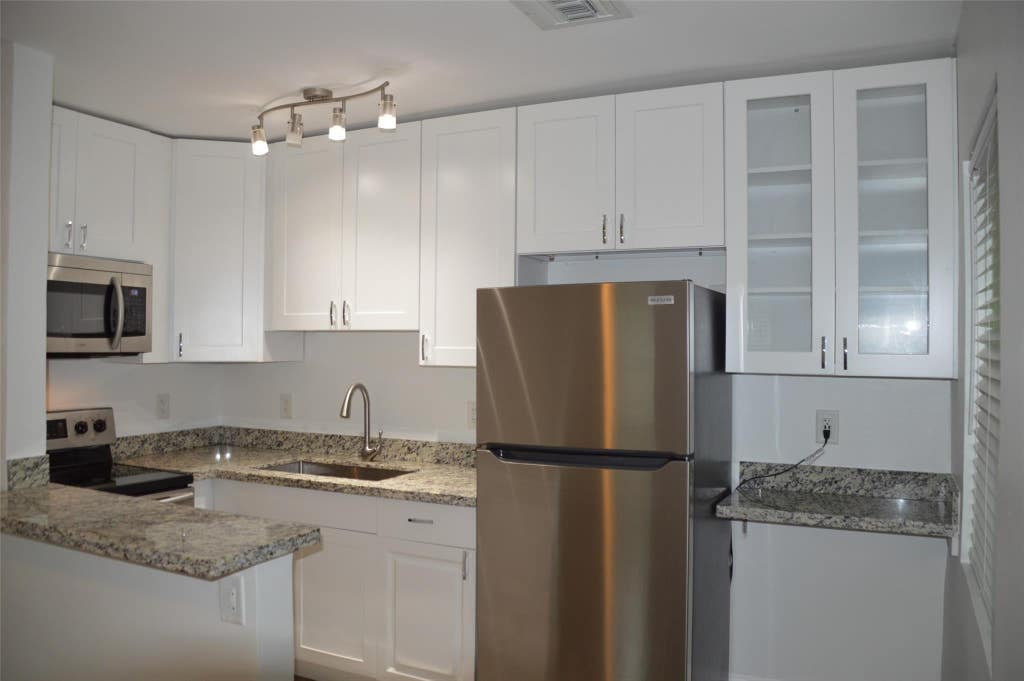 Photo of 819 NE 14th Court #B, Fort Lauderdale, FL 33304 (MLS # B26043553)