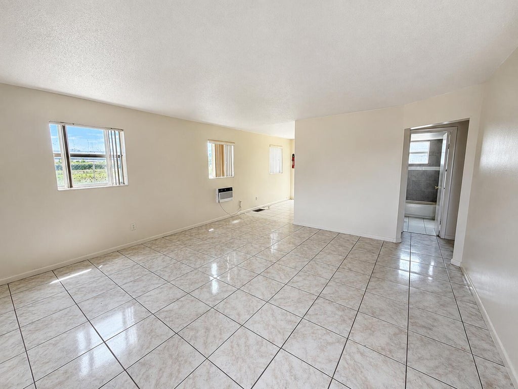 Photo of 1521 W 21st Street #6, Riviera Beach, FL 33404 (MLS # B26070559)