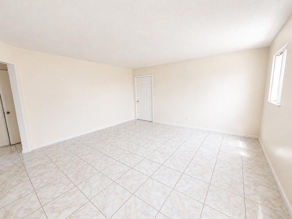 Photo of 1521 W 21st Street #6, Riviera Beach, FL 33404 (MLS # B26070559)