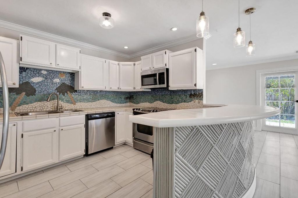 Photo of 1225 16th Ave N B, Lake Worth Beach, FL 33460 (MLS # R11154974)