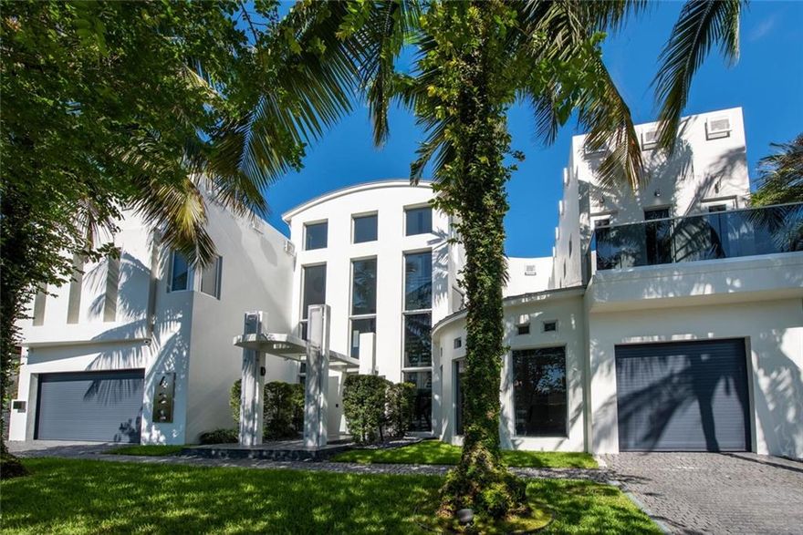 "GLASS HOUSE" PRIME 3 STORY SOUTH LAS OLAS ZEN CONTEMPORARY JUST OFF THE NEW RIVER! 5 MINUTES WALK TO DOWNTOWN LAS OLAS BLVD! 80 FEET OF DEEP WATER DOCKAGE JUST 5-10 MINUTES TO PORT EVERGLADES! NICE VIEWS OF THE NEW RIVER FROM THE GRAND TROPICAL BACKYARD! THREE STORY 35' HIGH GRAND FOYER WITH DRAMATIC GLASS ELEVATOR! 7 BEDROOMS 6 FULL BATHROOMS 3 HALF BATHS, 3 CAR GARAGE, HEATED SALT WATER POOL!HOME THEATER ON THIRD FLOOR! 7,750 SQUARE FEET GROSS. CGI TOP OF THE LINE WINDOWS! NEW PORCELAIN FLOORS! GRAND SOUTH FLORIDA ENTERTAINING AWAITS! BEST VALUE IN SOUTH EAST FORT LAUDERDALE WATERFRONT FOR A LARGE CONTEMPORARY PROPERTY!