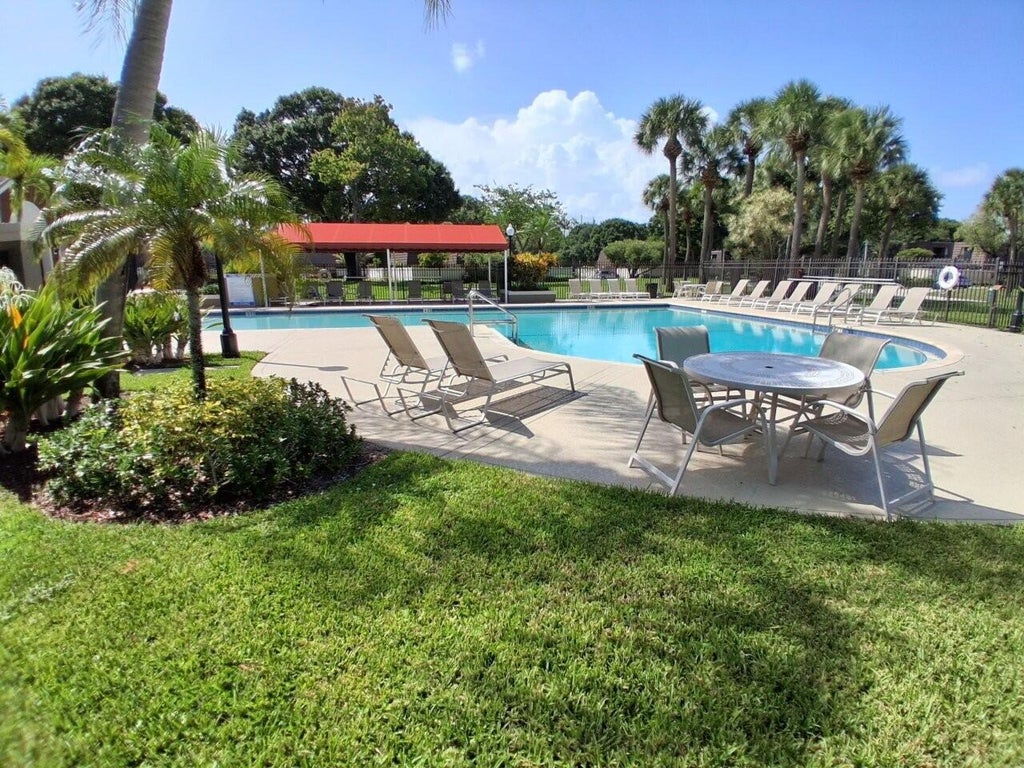 Photo of 7614 76th Way, West Palm Beach, FL 33407 (MLS # B26094982)