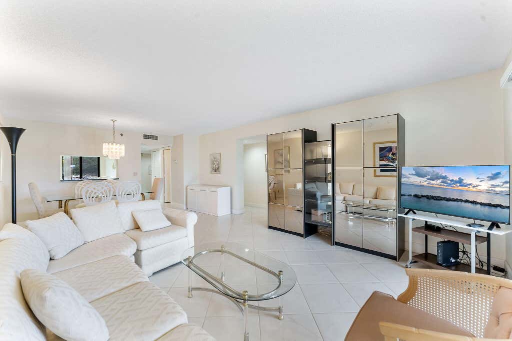 Photo of 7260 Kinghurst Drive #205, Delray Beach, FL 33446 (MLS # B26034797)