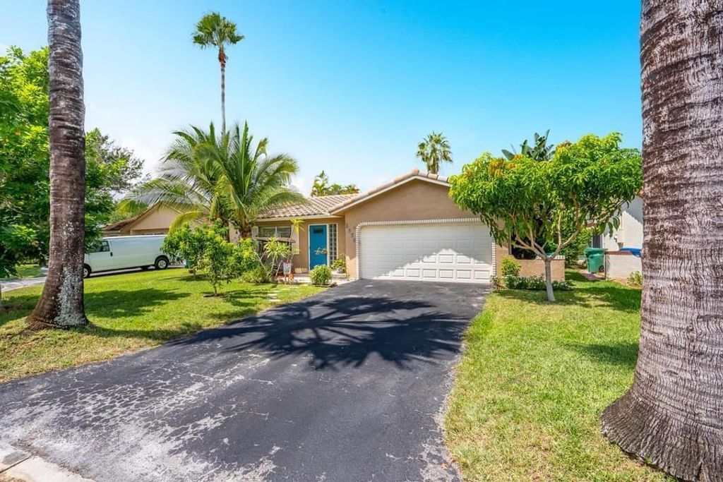 Photo of 2338 NW 98th Way, Coral Springs, FL 33065 (MLS # R10750380)