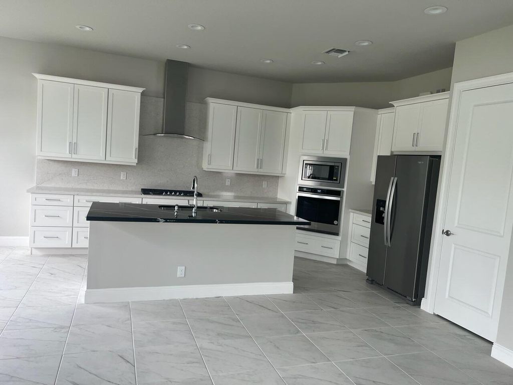 Photo of 9296 Crestview Circle, Palm Beach Gardens, FL 33412 (MLS # R10939239)