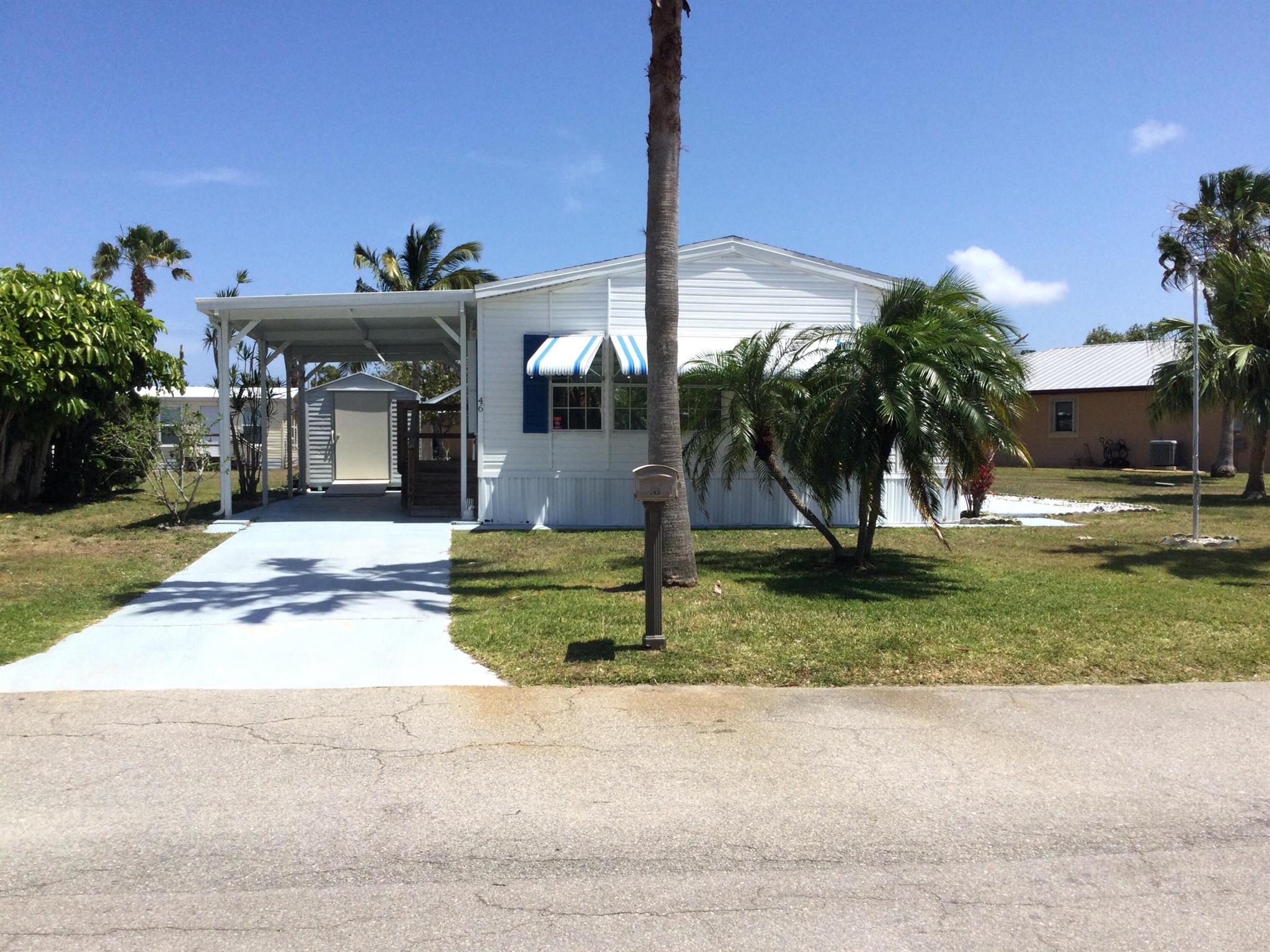 Nicely maintained furnished home in the pet section of Spanish Lakes. Home is situated in the rear of Spanish Lakes on a nice lot. Land lease covers all amenities, taxes, lawn care, sewer and trash removal. Amenities include golf, two pools, tennis, pickleball, bocce, billiards, shuffleboard, party room, game room, community room, library and much much more. Do as much as you like or just sit back and relax. Spanish Lakes is a 55 plus community. Future residents must be approved by Spanish Lakes. Call for application.