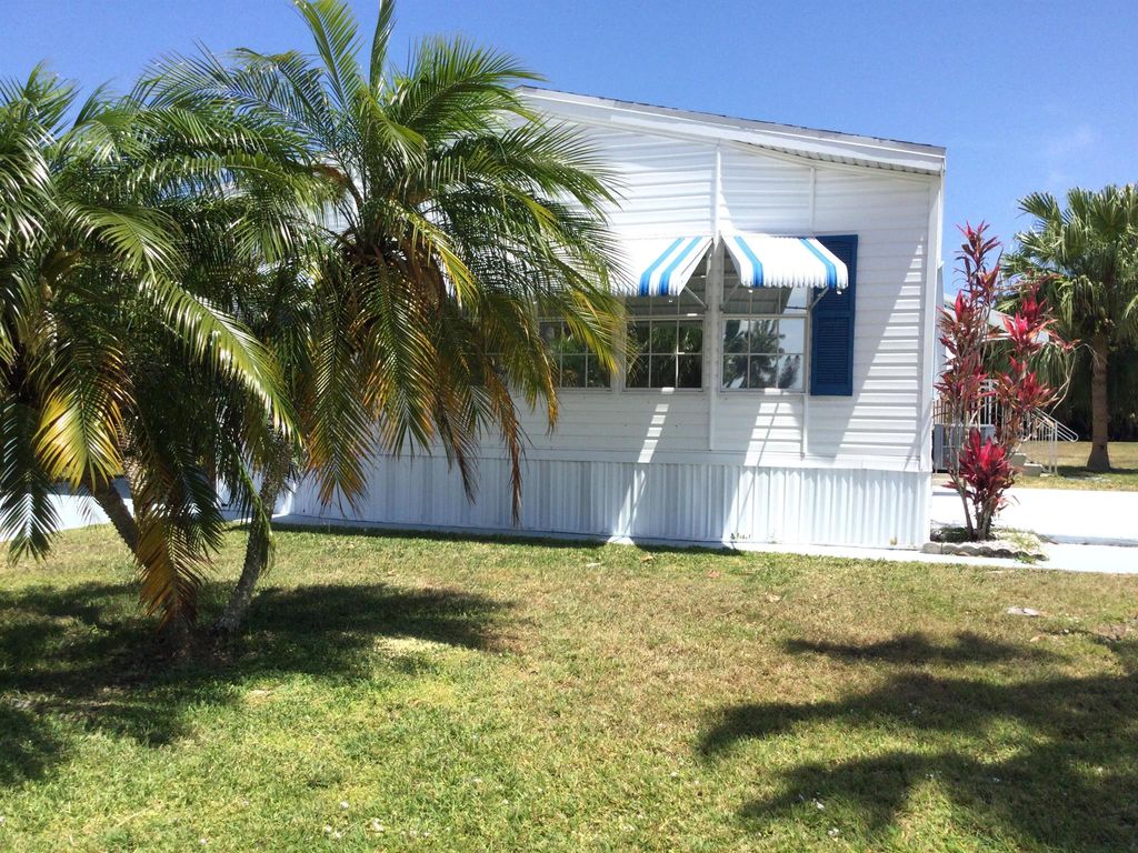 Photo of 46 Mediterranean Boulevard E, Port Saint Lucie, FL 34952 (MLS # R11084652)