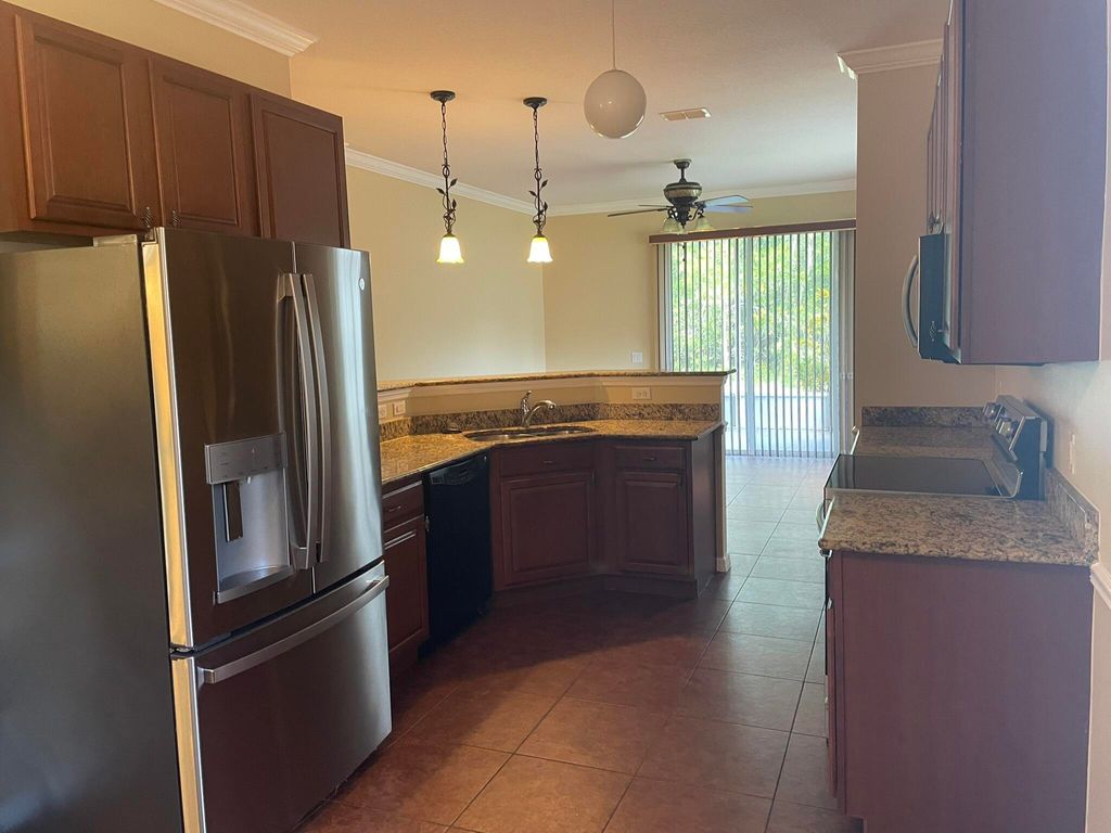 Photo of 5079 NW Fiddle Leaf Court, Port Saint Lucie, FL 34986 (MLS # R11140185)