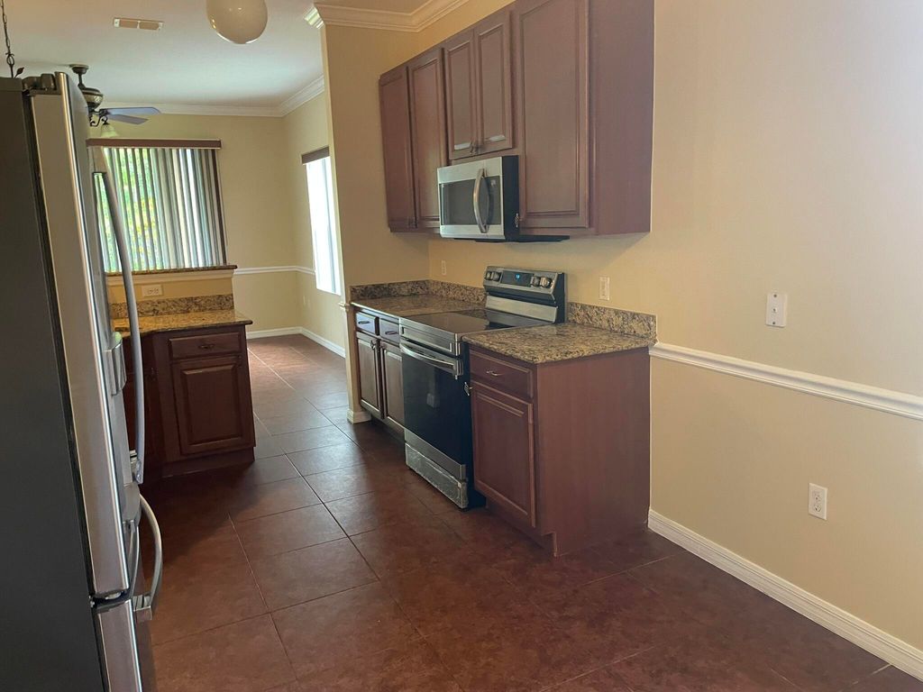 Photo of 5079 NW Fiddle Leaf Court, Port Saint Lucie, FL 34986 (MLS # R11140185)