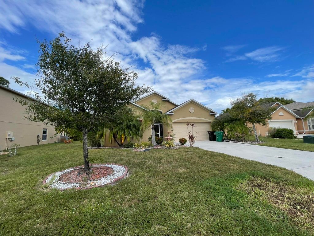 Photo of 5079 NW Fiddle Leaf Court, Port Saint Lucie, FL 34986 (MLS # R11140185)
