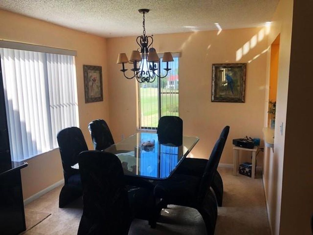 Photo of 5355 SE Miles Grant Road #E203, Stuart, FL 34997 (MLS # F10375640)