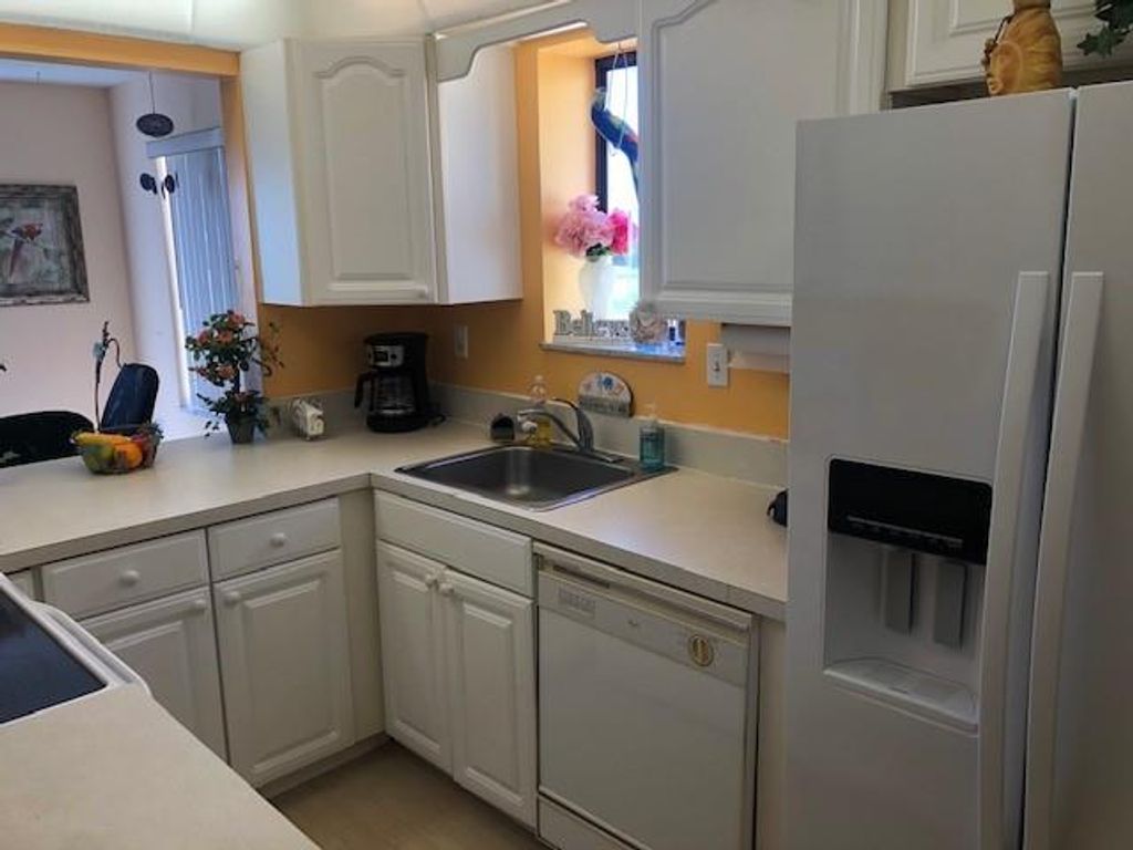 Photo of 5355 SE Miles Grant Road #E203, Stuart, FL 34997 (MLS # F10375640)