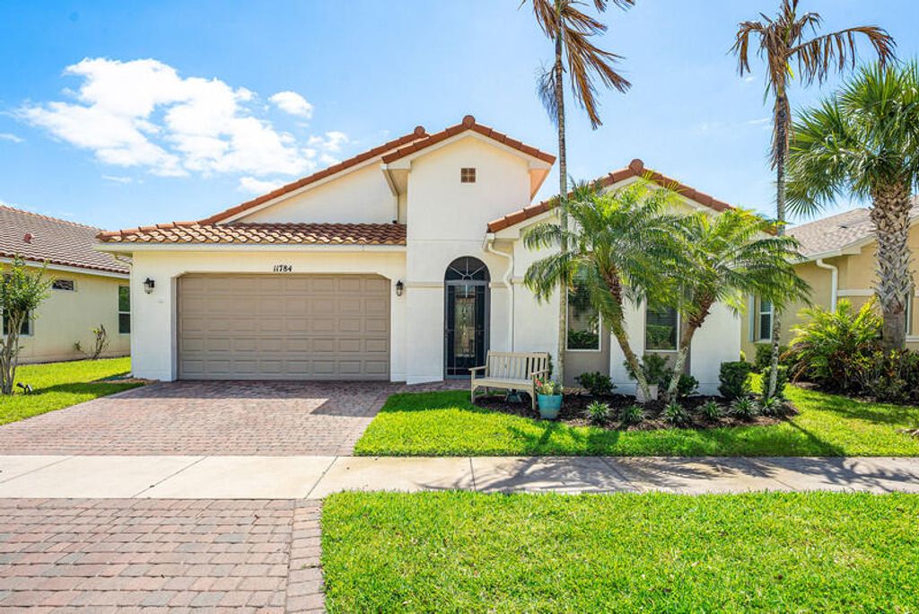 Photo of 11784 SW Mountain Ash Circle SW, Port Saint Lucie, FL 34987 (MLS # B26016792)