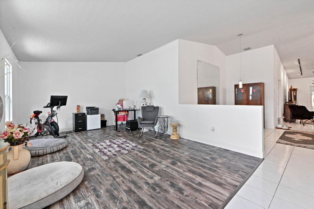 Photo of 7910 Burlwood Lane, Lake Worth, FL 33467 (MLS # B26031429)