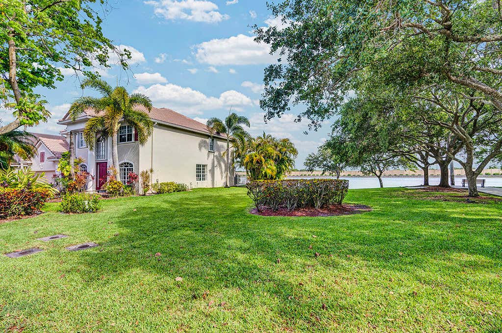 Photo of 10290 NW 60th Place, Parkland, FL 33076 (MLS # B26036202)