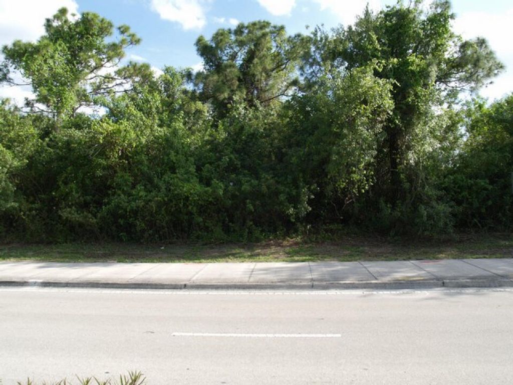 Photo of 134 SW Becker Road, Port Saint Lucie, FL 34953 (MLS # R10869048)