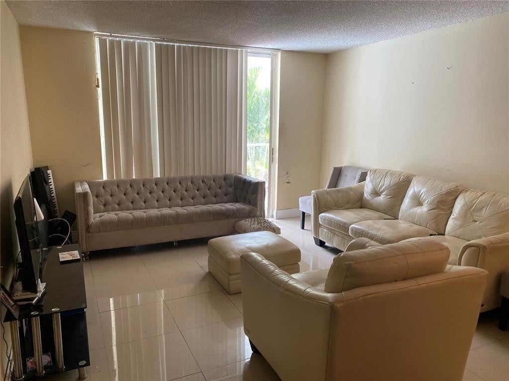 486 NW 165th Street Road B 206, Miami FL 33169