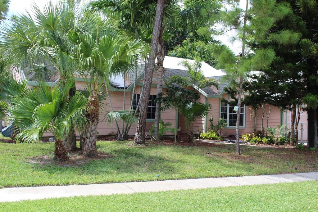 Photo of 785 Juniper Place, Wellington, FL 33414 (MLS # R11109595)