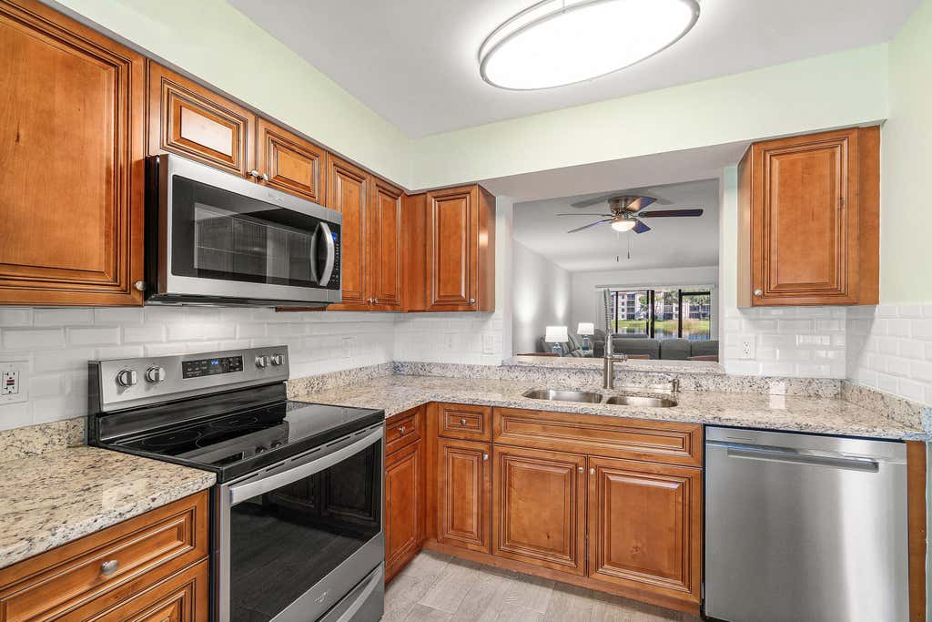 Photo of 6149 Pointe Regal Circle #108, Delray Beach, FL 33484 (MLS # R11140514)