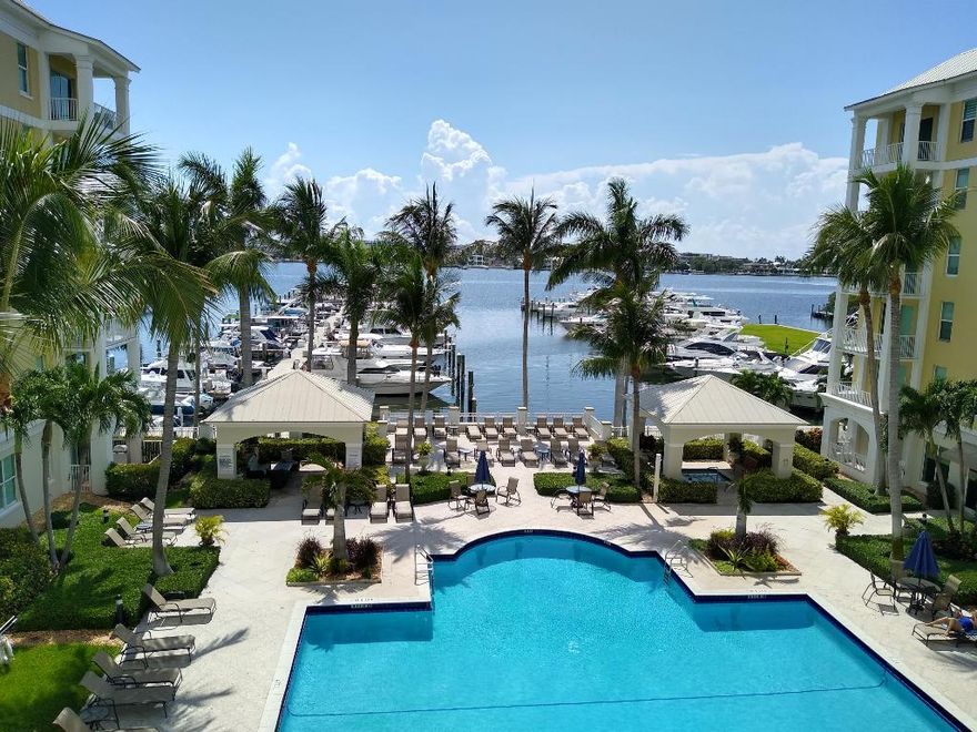 Furnished seasonal rental for 2025-2026. This 3 bedroom 2 bath condominium is being offered with a view of the resort style pool and marina. The interior is tastefully decorated and feels relaxing from the moment you walk in. Beautiful porcelain tile throughout, views from every room, king size bed in master bedroom with updated en suite bathroom and walk-in shower. The third bedroom is designed as an office but has a couch with pull out bed. Both main bedrooms have tv's, and walk-in closets. Full size washer & dryer in the unit. Come wake up to the morning sun and enjoy your coffee or tea catching the boats launch. The Mooring of Lantana is resort style living with many amenities including two heated pools with hot tubs, professional fitness center, and much more. A must see!