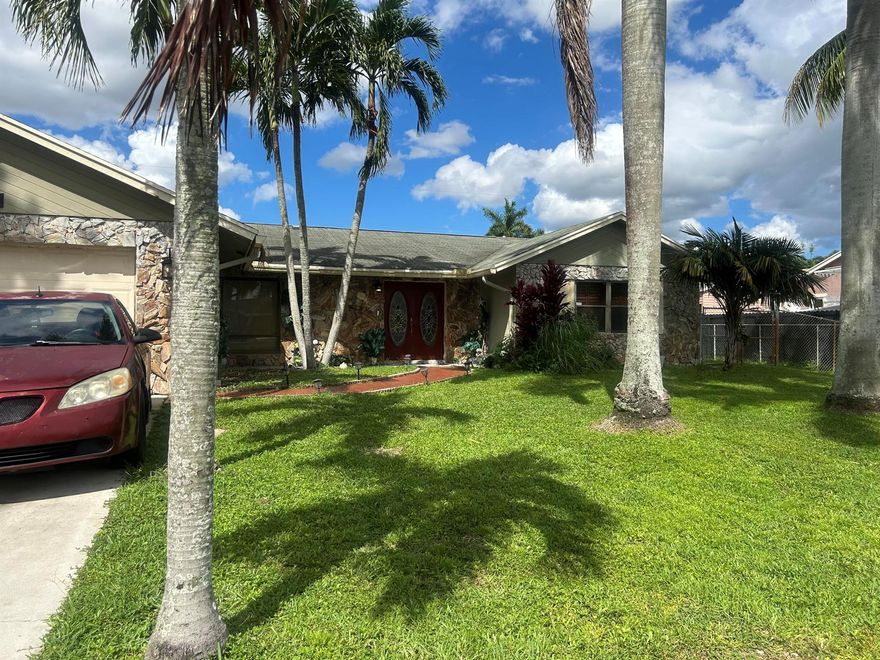 4 Bed / 2 Bath Home in the highly sought Florida Gardens community.  Top A-rated schools nearby, minutes to the beach, shopping, and major highways.With electric, water, & lawn care included and no HOA you can tour today and move in tomorrow.White designer kitchen w/ stainless steel appliances, granite counters & breakfast nook. Awesome split floor plan - master suite separate from kids/guest room. Screened-in patio (great bonus space)Large fenced backyard. Impact windows. Crown molding throughout. Washer & dryer in home.1st + Security only. Will work with credit.Tenant occupied until 10/31 but don't wait see it now! Garage was converted to an efficiency and can be rented along with house for $5000/mo. Great if caring for an elderly loved one or have a big family.