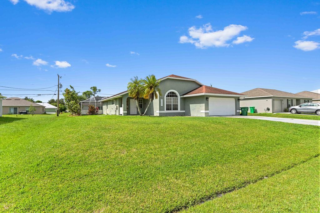 Photo of 1290 SW Melrose Avenue, Port Saint Lucie, FL 34953 (MLS # R11117519)