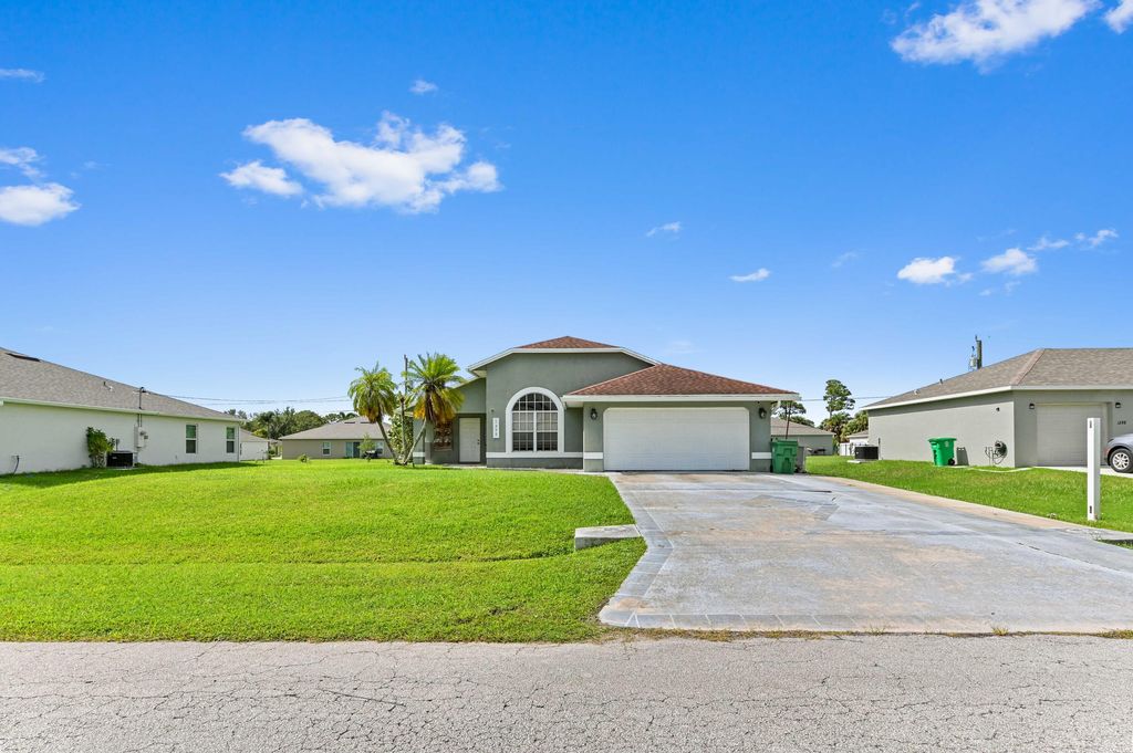 Photo of 1290 SW Melrose Avenue, Port Saint Lucie, FL 34953 (MLS # R11117519)
