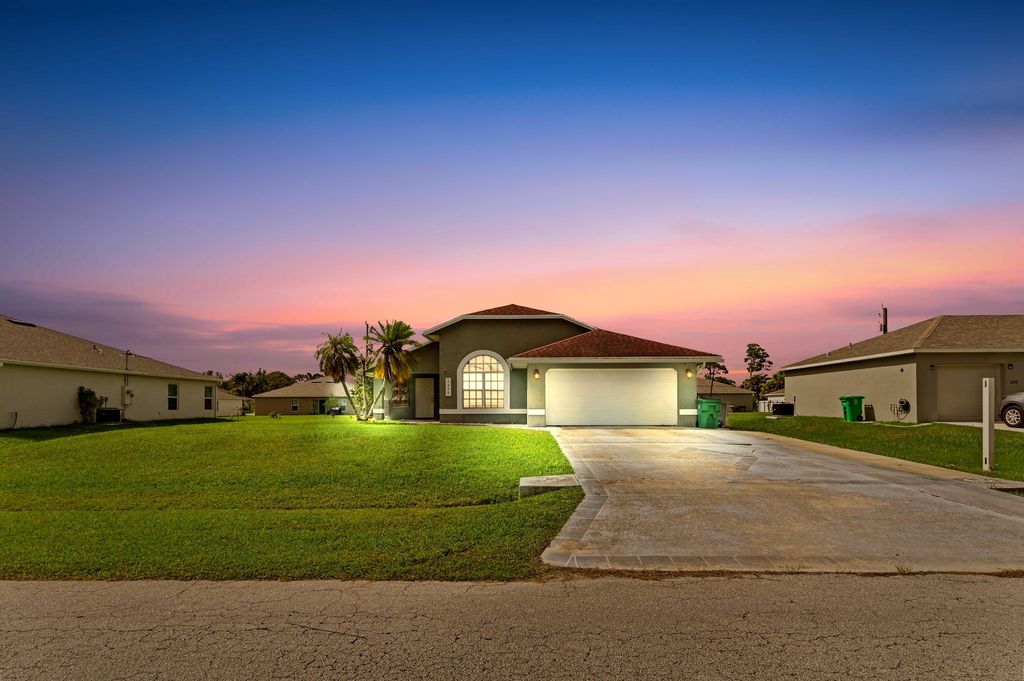 Photo of 1290 SW Melrose Avenue, Port Saint Lucie, FL 34953 (MLS # R11117519)