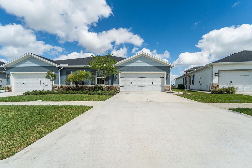 Photo of 9449 SW Libertas Way, Port Saint Lucie, FL 34987 (MLS # B26010549)