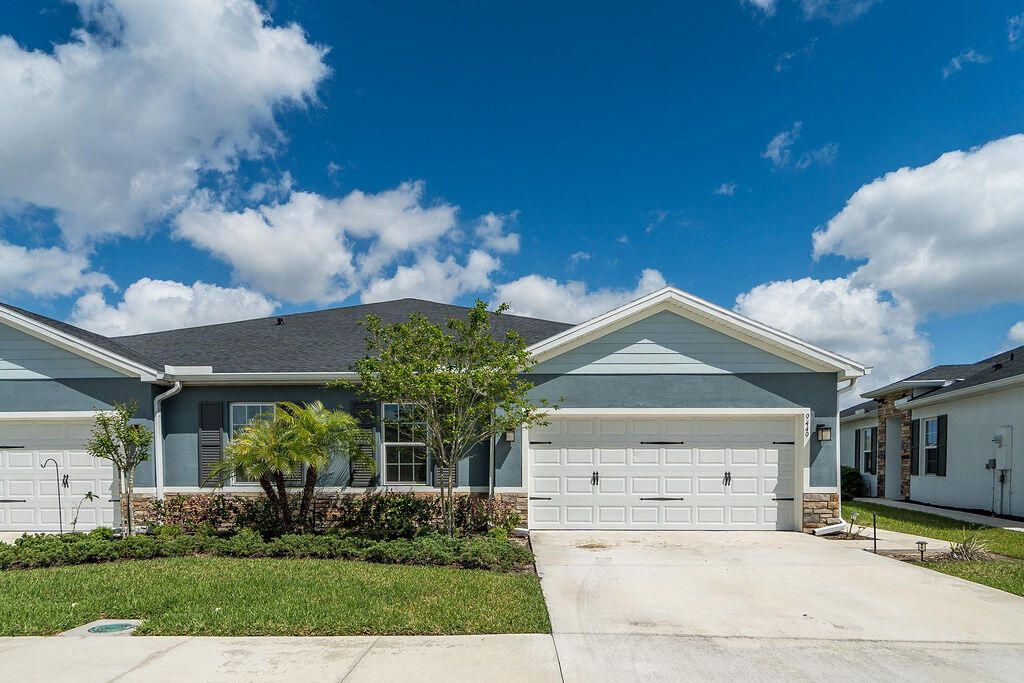 Photo of 9449 SW Libertas Way, Port Saint Lucie, FL 34987 (MLS # B26010549)