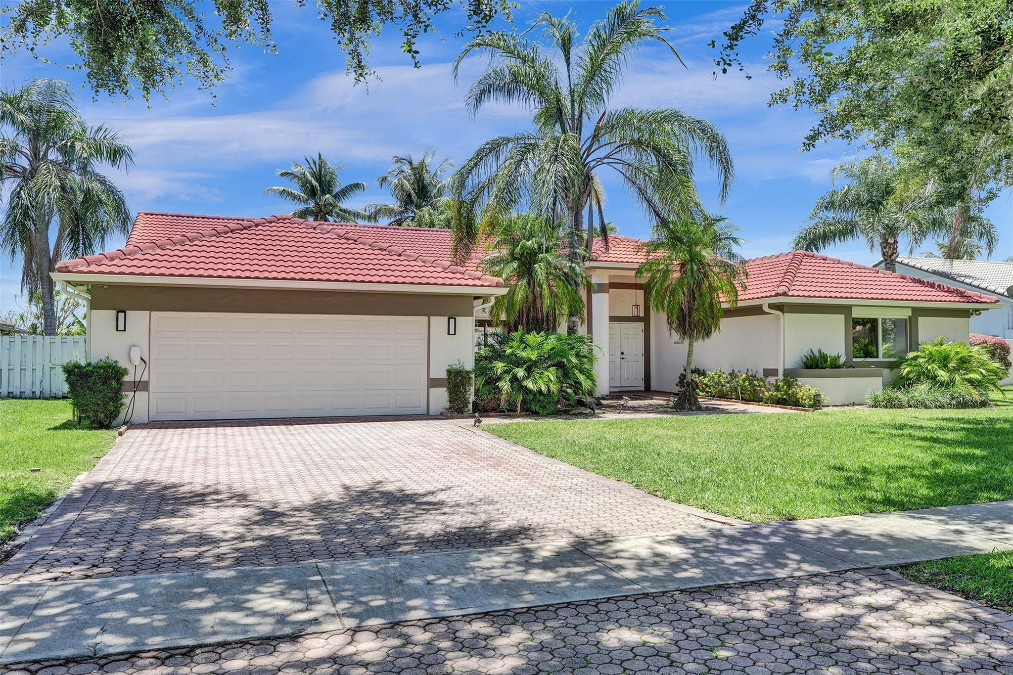 STUNNING LAKEVIEW HOME FEATURING 5 BEDROOMS, A DEN, AND 3 FULL BATHROOMS, LOCATED IN THE SOUGHT-AFTER COMMUNITY OF JACARANDA LAKES, KNOWN FOR ITS FRIENDLY NEIGHBORS AND SERENE ENVIRONMENT. ENJOY OUTDOOR LIVING WITH A HEATED POOL, NEW PAVERS, UPGRADED DIAMOND BRITE AND TILE. RECENT UPGRADES INCLUDE BRAND-NEW IMPACT WINDOWS (2023) ALONG WITH A NEWLY INSTALLED FENCE. THE ROOF WAS REPLACED IN 2015. THE HOME OFFERS TWO A/C UNITS—ONE INSTALLED IN 2023, AND A WATER HEATER IN 2021. THERE IS A HUGE LIVING ROOM THAT IS CURRENTLY USED AS A PLAYGROUND AND CAN BE MADE AS A 6TH BEDROOM. SITUATED IN A TOP-RATED ELEMENTARY SCHOOL DISTRICT AND CONVENIENTLY CLOSE TO PARKS, SHOPPING CENTERS, AND MORE. THIS HOME BLENDS COMFORT, CONVENIENCE, AND LOCATION—A TRUE GEM YOU WON’T WANT TO MISS!