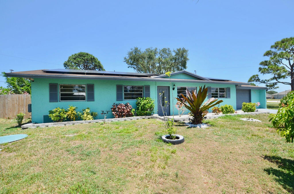 Photo of 591 SW Dwight Avenue, Port Saint Lucie, FL 34983 (MLS # R10985986)