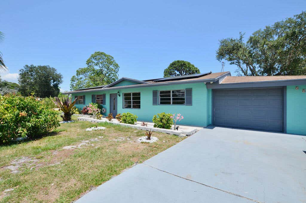 Photo of 591 SW Dwight Avenue, Port Saint Lucie, FL 34983 (MLS # R10985986)