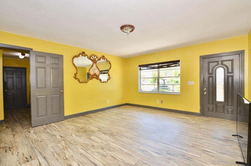 Photo of 591 SW Dwight Avenue, Port Saint Lucie, FL 34983 (MLS # R10985986)