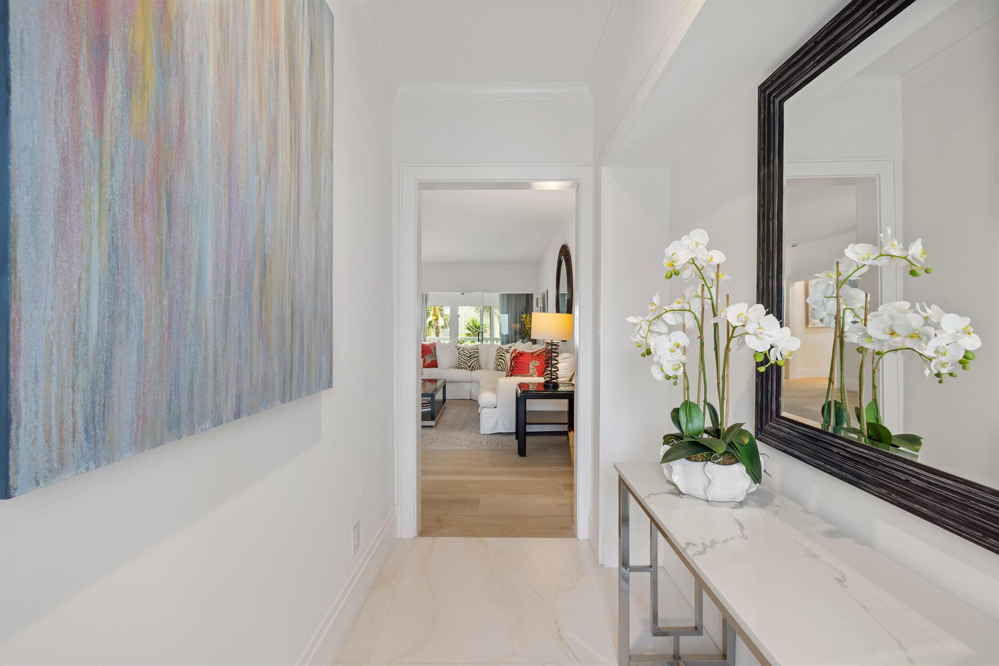 Step into effortless Palm Beach living with this beautifully renovated 2-bedroom, 2-bathroom condo in the iconic 300 S Ocean Blvd. This stylish unit features impact windows and doors, an updated kitchen, and sunlit living spaces designed for comfort and ease. Residents enjoy premier amenities including 24-hour doorman service, a newly renovated fitness center, heated pool, beach access, and dedicated garage parking. The building is also pet-friendly with no size restrictions, offering flexibility for full-time or seasonal living.The adjacent 2-bedroom unit, 3F, is also for sale, presenting a unique opportunity to own both side-by-side condos. Create an expansive custom residence or keep one as a separate guest suite or private retreat--the possibilities are endless