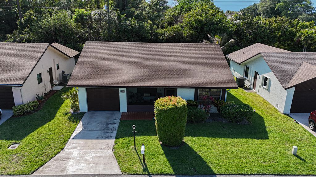 Photo of 6329 Tall Cypress Circle, Greenacres, FL 33463 (MLS # B26008528)