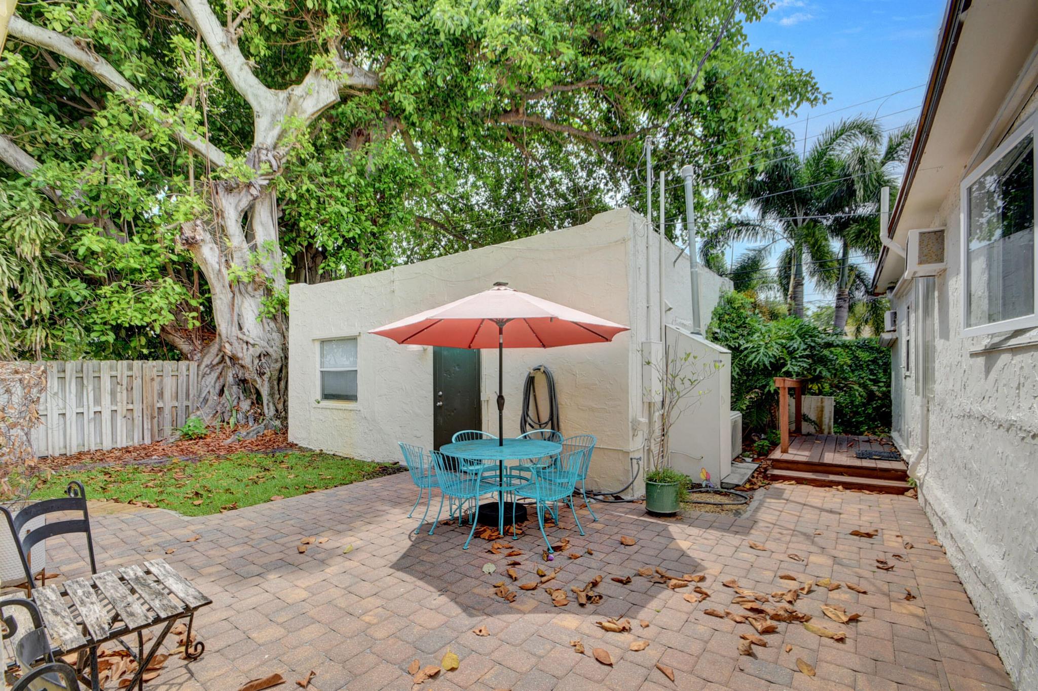 Charming 1-bedroom studio tucked away at the rear of the property, offering privacy and a quiet retreat. This cozy unit features a mini-split A/C, full kitchen, and bathroom, with a gated courtyard perfect for enjoying the outdoors. Convenient on-site laundry with a small storage area for detergents and essentials. Ideally located near parks, schools, and everyday conveniences--an excellent place to call home.
