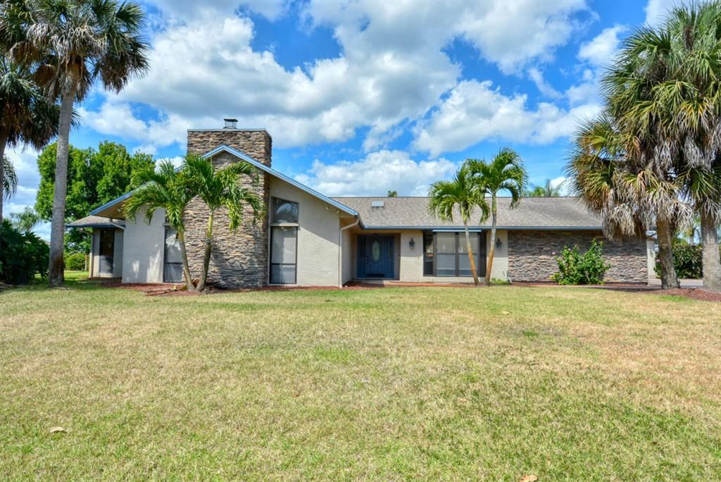 Photo of 2486 SE Elston Street, Port Saint Lucie, FL 34952 (MLS # R10706518)